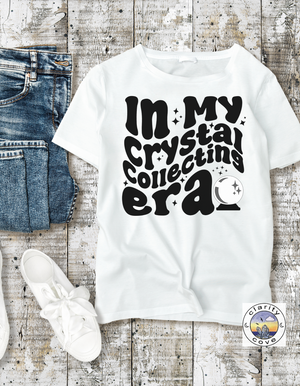 in my crystal collecting era white comfort colors retro groovy crystal ball oversized t-shirt by clarity cove